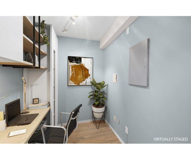 Office space with baseboards and light wood-style floors | Image 11
