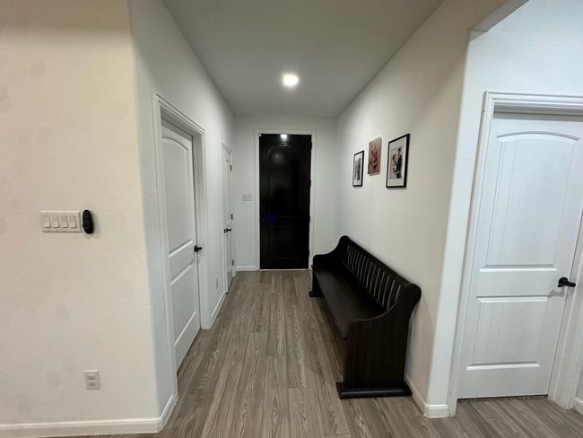 Bedroom featuring a tray ceiling, recessed lighting, carpet floors, and a ceiling fan | Image 15
