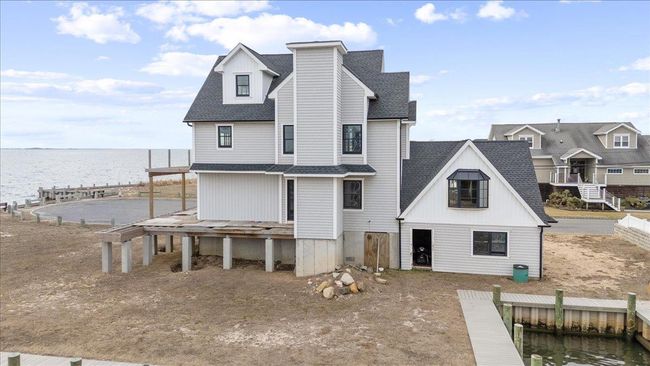 Rear view of property featuring a water view | Image 16