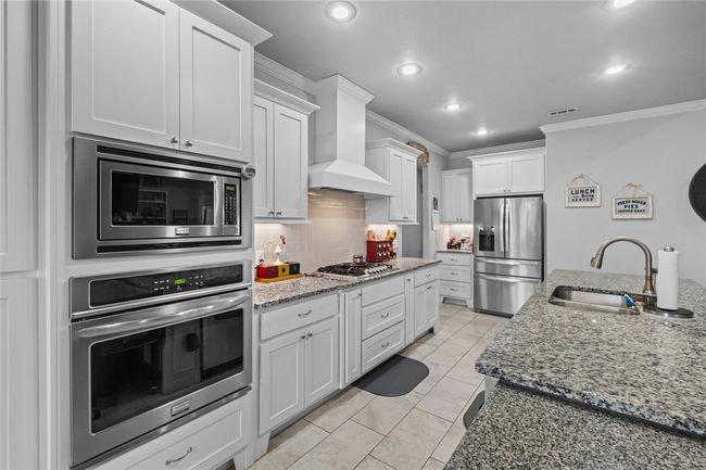 Conventional oven, gas cook top, microwave and dishwasher will make the cooks job so much easier. | Image 13