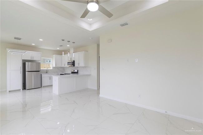 Open Living - Dining-Kitchen Area. | Image 11