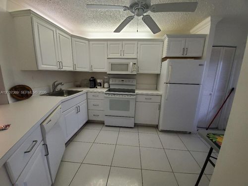105-1-1750 Ne 191st St, Miami, FL, 33179-4284 | Card Image