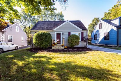 View of front of property featuring a front lawn | Image 1