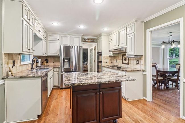 7412 Mid Broadwell Trce, House other with 5 bedrooms, 4 bathrooms and 2 parking in alpharetta GA | Image 7