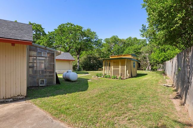 Additional storage building in the backyard. | Image 27