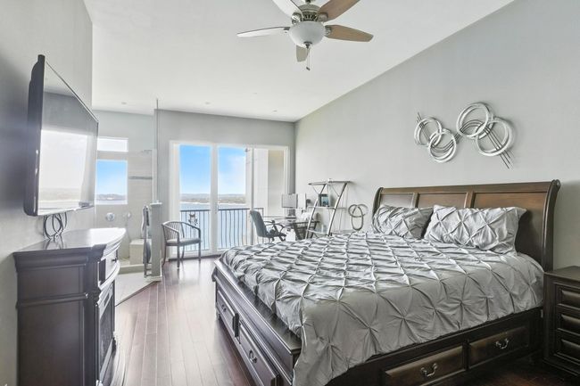 Bedroom featuring dark wood-type flooring | Image 15