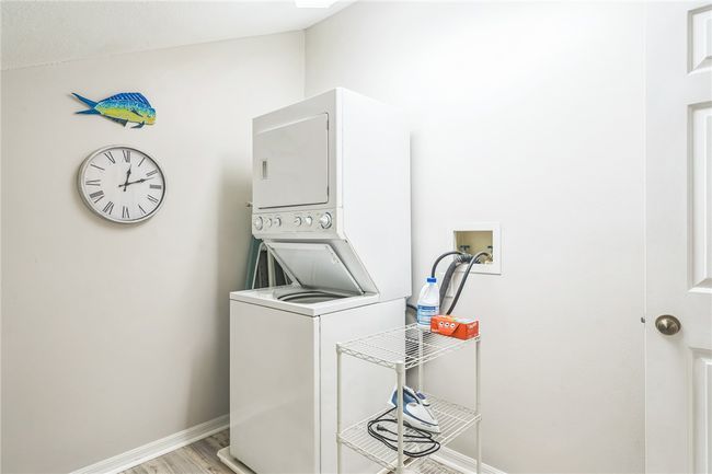 Large utility room located upstairs | Image 29