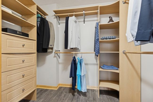 Upper Level Primary Bedroom Custom Walk-in Closet | Image 25