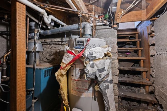 Utility room with water heater | Image 20