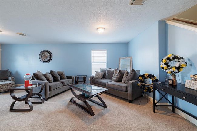 Another view of the formal living and dining areas. | Image 5