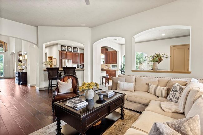 View showing the open floorplan between the family room, kitchen and breakfast area. | Image 9