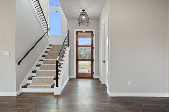 Entryway featuring wood floors | Image 6