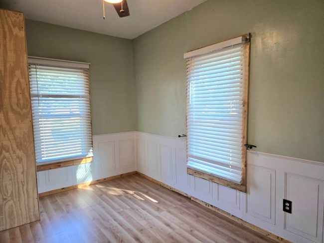Spare room featuring light hardwood / wood-style floors and ceiling fan | Image 13