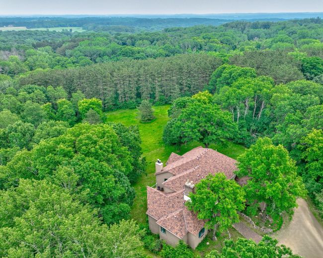 Loved by its original owner, this home is a masterpiece of warmth and wonder—just waiting for your modern touches to bring the next chapter to life! | Image 49