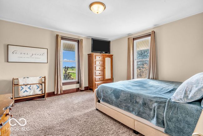 bedroom with carpet floors | Image 36