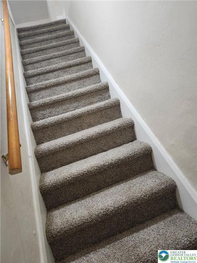 Stairs to second level of the apartment | Image 15