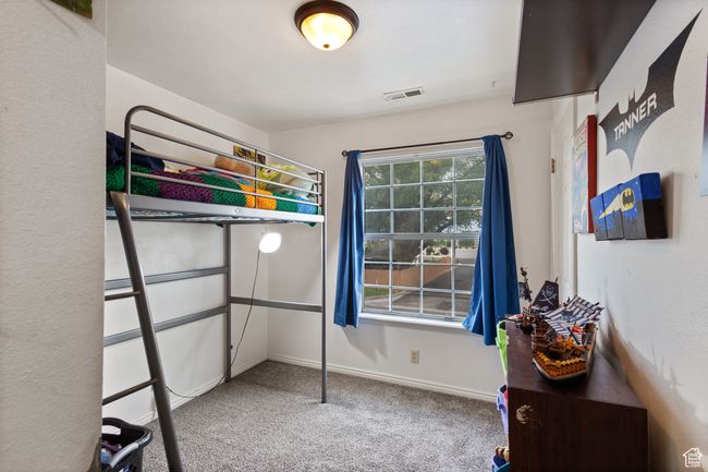Bedroom featuring carpet and baseboards | Image 14