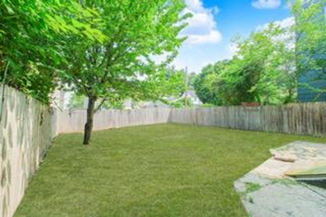 Fenced backyard featuring a patio | Image 18