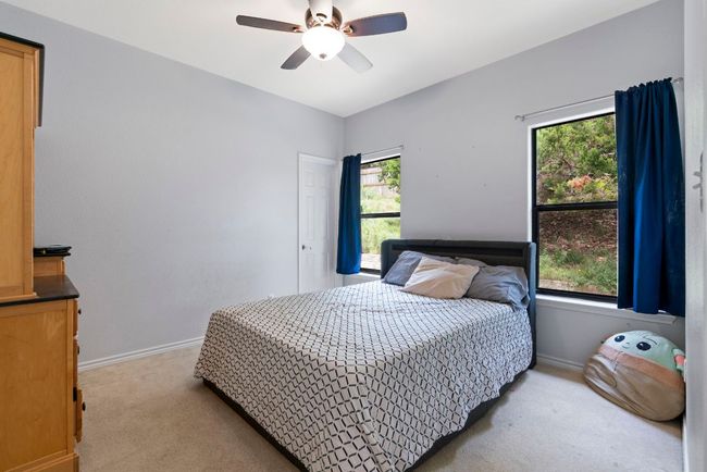 Secondary bedrooms are well-sized, with plenty of flexibility for guests, work, or hobbies. | Image 24