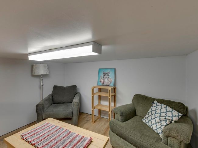 Living room featuring wood finished floors | Image 29