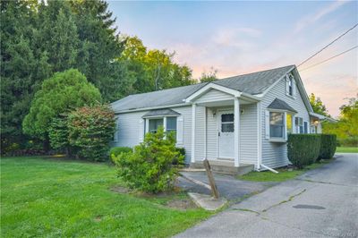 View of front of home with a lawn | Image 3