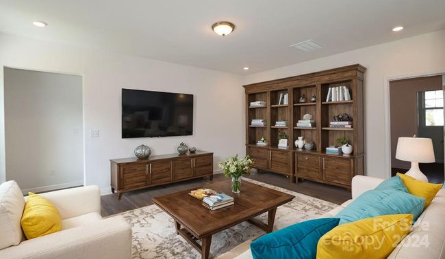 Family room shown with virtual staging | Image 18