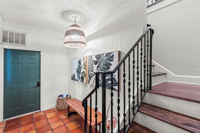 Beautiful wrought iron railings welcome you as you enter the home | Image 5
