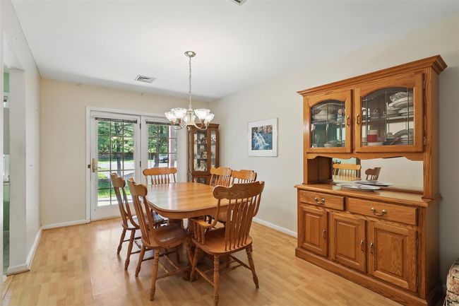Large dining room with access to patio | Image 7