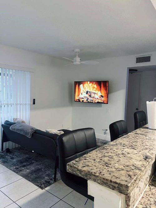 h-4435 Treehouse Ln, Tamarac, FL, 33319-3394 | Card Image
