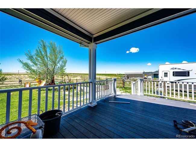 59466 E Commanche Way, House other with 3 bedrooms, 3 bathrooms and null parking in Strasburg CO | Image 24