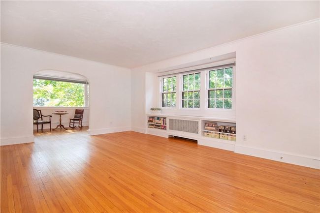Expansive living room looking into sitting room/music room/office. | Image 6
