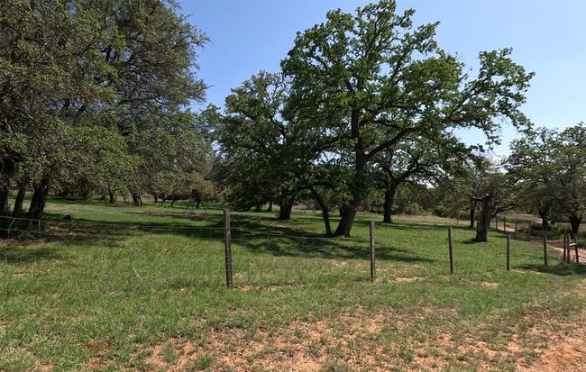 View of yard featuring fence | Image 20