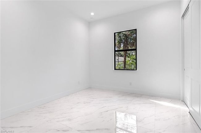 View of tiled empty room | Image 32