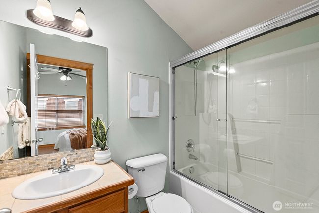 A full bathroom with skylight here. | Image 16