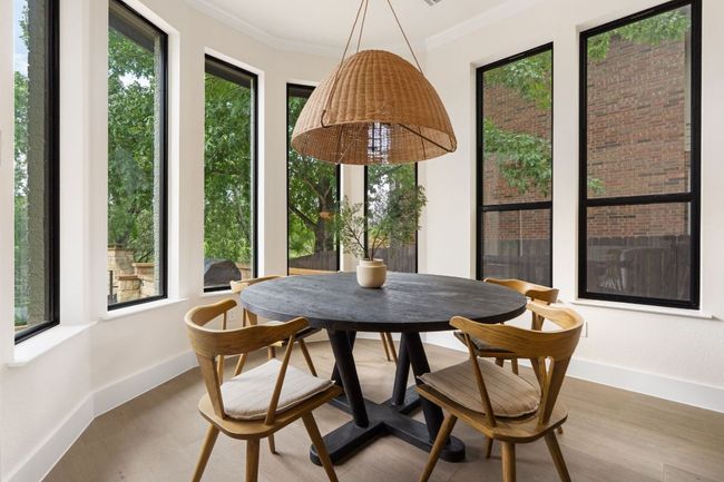 Tucked beside the kitchen and bathed in natural light, the breakfast room is the perfect spot for casual dining, morning coffee, or weekend brunch. | Image 12