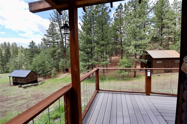 Wooden deck with a lawn | Image 6