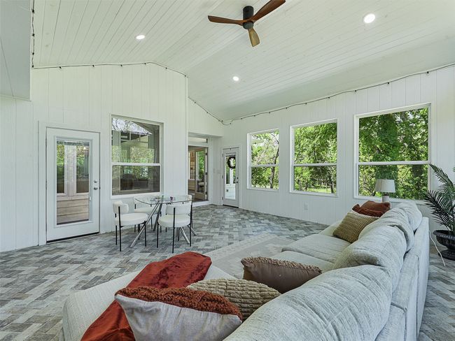 Sunroom featuring a wealth of natural light | Image 22