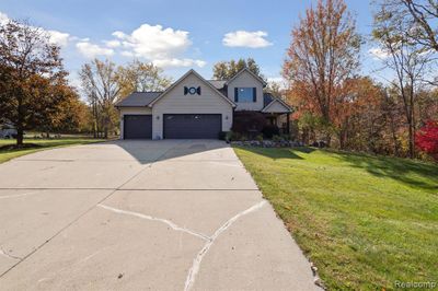 10480 Denton Creek Drive, Home with 4 bedrooms, 2 bathrooms and null parking in Tyrone Twp MI | Image 3