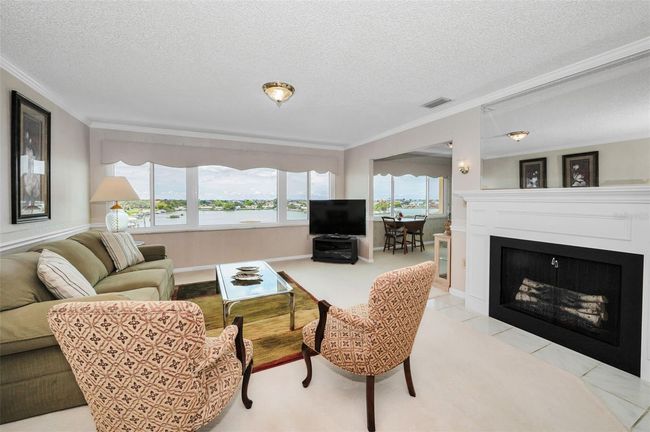 Living room with a fireplace | Image 4