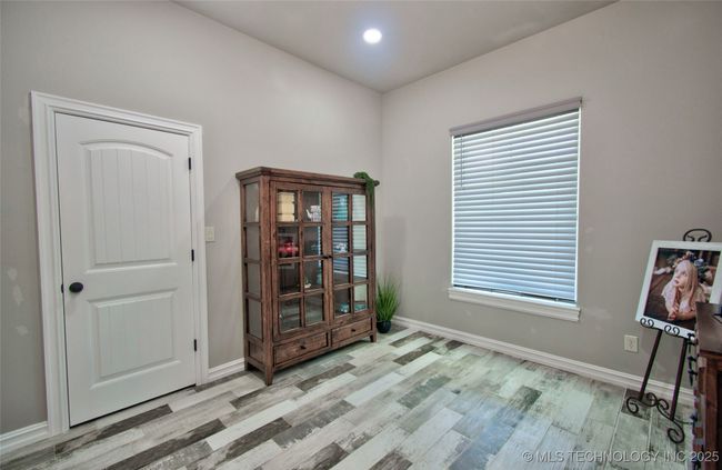 Office adjacent to living room. | Image 26