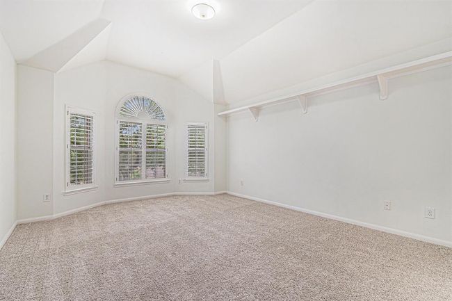 This is one of four secondary bedrooms located upstairs! Each is very spacious and has its own character and charm! | Image 29