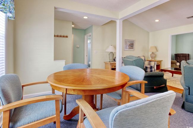 Dining room with recessed lighting, healthy amount of natural light, and vaulted ceiling | Image 10