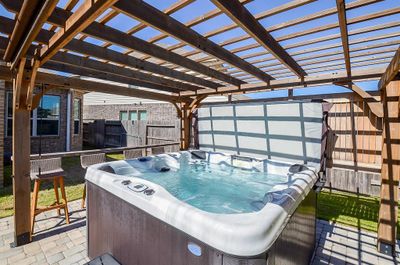 Another view of the inviting hot-tub to relax and soothe the nerves! | Image 2