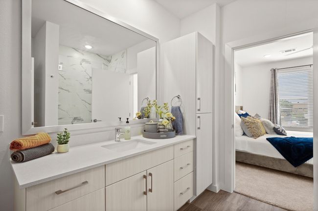 Ensuite bathroom featuring vanity, LVP flooring, oversized vanity *Photos are of similar unit* | Image 10