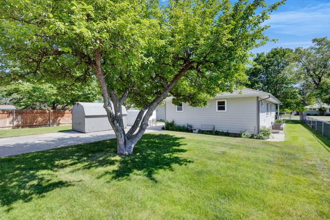 View of front of house featuring a storage shed | Image 47