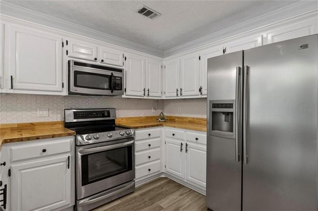 4220 Singing Post Ln Ne, House other with 5 bedrooms, 3 bathrooms and 2 parking in Roswell GA | Image 20