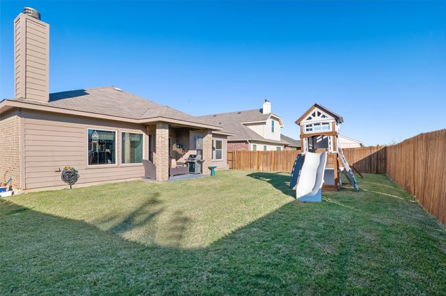 View of yard with a fenced backyard and a playground | Image 27
