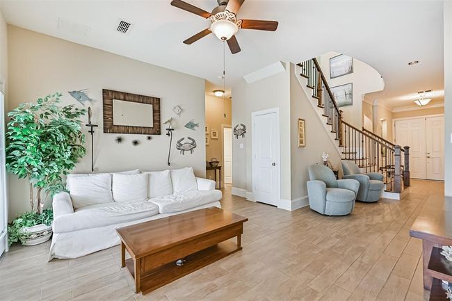 Downstairs living space | Image 19