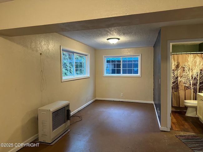 Master downstairs bedroom/family room | Image 19