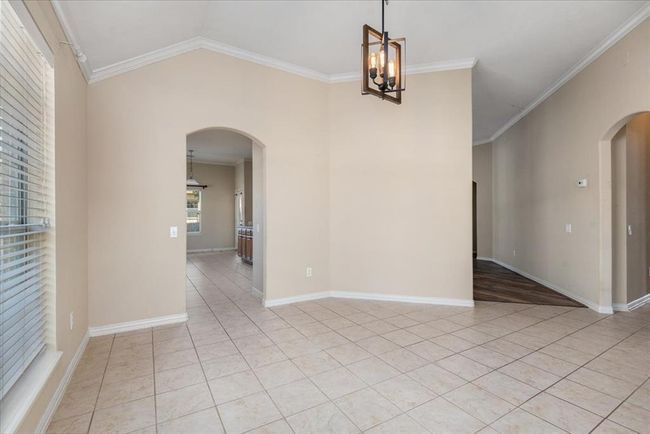Another view of the dining room looking into the Kitchen | Image 8